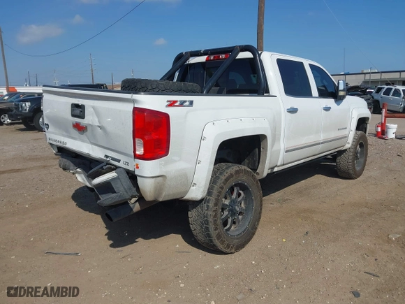 2017 Chevrolet Silverado 1500 LTZ with VIN 3GCUKSEJ9HG150558, listed as a IAAI auction lot 41514409 with 107,969 mi miles. Bid and sale history available at carsss.com. Image 4.