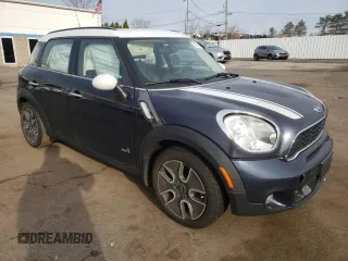 2012 MINI Countryman S with VIN WMWZC5C55CWL64092, listed as a Copart auction lot 50703855 with 69,785 mi miles and Salvage Title. Bid and sale history available at DreamBid. Image 4.