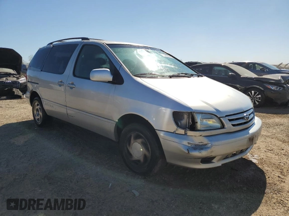 2002 Toyota Sienna LE with VIN 4T3ZF13C52U504138, listed as a Copart auction lot 74633984 with 154,406 mi miles and Salvage Title. Bid and sale history available at carsss.com. Image 4.