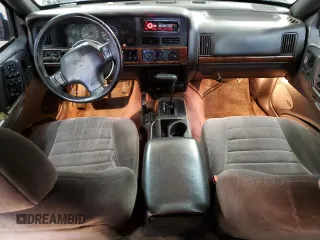 1996 Jeep Grand Cherokee Laredo with VIN 1J4GZ58S9TC370707, listed as a Copart auction lot 89285205 with 278,457 mi miles and Salvage Title. Bid and sale history available at carsss.com. Image 8.