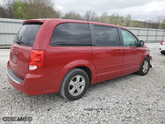 2012 Dodge Grand Caravan SXT with VIN 2C4RDGCGXCR172186, listed as a Copart auction lot 49641015 with 69,726 mi miles and Salvage Title. Bid and sale history available at carsss.com. Image 3.