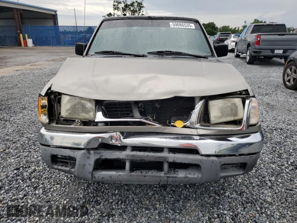 2000 Nissan Frontier XE with VIN 1N6DD26S6YC415423, listed as a Copart auction lot 59086535 with 122,746 mi miles and Salvage title. Bid and sale history available at DreamBid. Image 5.