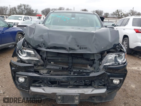 2021 Chevrolet Colorado 2WD Z71 with VIN 1GCGSDEN3M1108777, listed as a IAAI auction lot 41562874 with 77,607 mi miles and . Bid and sale history available at DreamBid. Image 6.