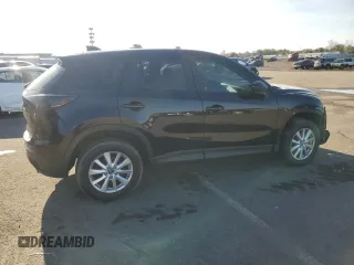 2014 Mazda CX-5 Sport with VIN JM3KE4BE1E0371547, listed as a Copart auction lot 85412744 with 119,597 mi miles and Salvage Title. Bid and sale history available at carsss.com. Image 3.