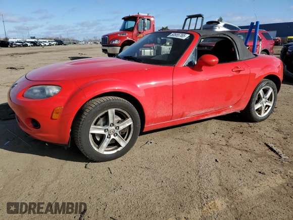 2006 Mazda MX-5 Miata Touring z VIN JM1NC25F360110572, wystawiony jako Copart lot #50555765 z przebiegiem 166 785 mil mil oraz Czysty tytuł • Clean title. Historia ofert i sprzedaży dostępna na DreamBid. Obrazek 1.