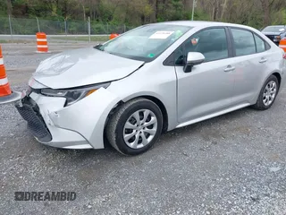 2021 Toyota Corolla LE with VIN 5YFEPMAE6MP213470, listed as a IAAI auction lot 41978188 with 105,006 mi miles. Bid and sale history available at carsss.com. Image 2.