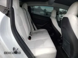 2022 Tesla Model 3 Long Range with VIN 5YJ3E1EB4NF164276, listed as a Copart auction lot 45802865 with 56,836 mi miles and Salvage Title. Bid and sale history available at DreamBid. Image 11.