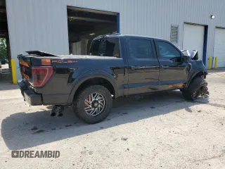 2021 Ford F-150 XL with VIN 1FTFW1E52MFB31825, listed as a Copart auction lot 61462735 with 76,653 mi miles and Salvage title. Bid and sale history available at DreamBid. Image 3.