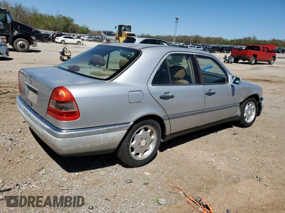 1995 Mercedes-Benz C with VIN WDBHA28E7SF255142, listed as a Copart auction lot 68411704 with 334,000 mi miles and Salvage Title. Bid and sale history available at carsss.com. Image 3.