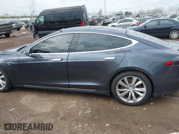 2015 Tesla Model S 85D with VIN 5YJSA1E21FF116775, listed as a IAAI auction lot 41876772 with 128,805 mi miles. Bid and sale history available at carsss.com. Image 15.