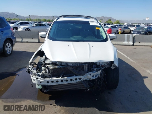 2013 Ford Escape SE with VIN 1FMCU0GX9DUB83638, listed as a IAAI auction lot 42471869 with 213,356 mi miles and . Bid and sale history available at DreamBid. Image 13.