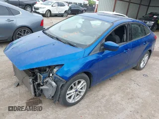 2018 Ford Focus SE with VIN 1FADP3F23JL210539, listed as a IAAI auction lot 41921226 with 100,609 mi miles. Bid and sale history available at carsss.com. Image 18.