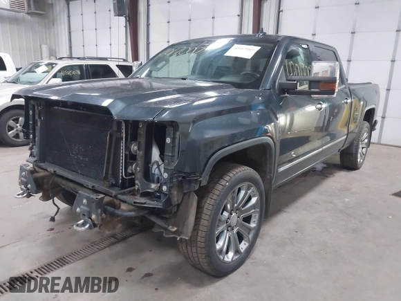 2017 GMC Sierra 1500 Denali z VIN 3GTU2PEJ1HG176844, wystawiony jako IAAI lot #42017007 z przebiegiem 185 433 mil mil oraz . Historia ofert i sprzedaży dostępna na DreamBid. Obrazek 23.
