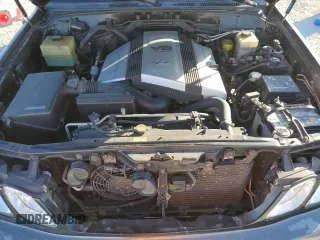 2000 Lexus LX 470 z VIN JT6HT00W3Y0090164, wystawiony jako Copart lot #41338515 z przebiegiem 209 338 mil mil oraz Szkoda całkowita • Salvage title. Historia ofert i sprzedaży dostępna na DreamBid. Obrazek 12.