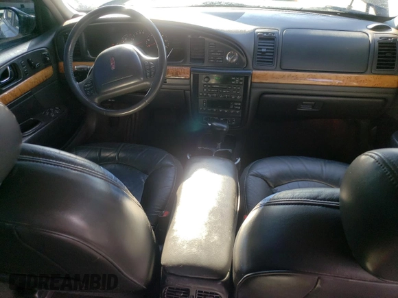 1998 Lincoln Continental with VIN 1LNFM97V7WY637848, listed as a Copart auction lot 43510885 with 141,796 mi miles and Salvage Title. Bid and sale history available at carsss.com. Image 8.