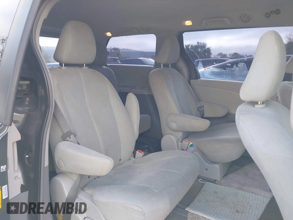 2014 Toyota Sienna L with VIN 5TDZK3DC6ES421278, listed as a IAAI auction lot 41178679 with 202,823 mi miles. Bid and sale history available at carsss.com. Image 8.