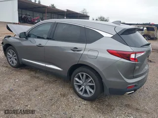 2023 Acura RDX w/Technology Package with VIN 5J8TC1H59PL004665, listed as a IAAI auction lot 40735574 with 14,242 mi miles. Bid and sale history available at carsss.com. Image 3.