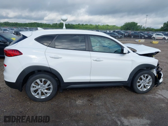 2019 Hyundai Tucson Value z VIN KM8J33A41KU013023, wystawiony jako IAAI lot #42302643 z przebiegiem 41 231 mil mil oraz . Historia ofert i sprzedaży dostępna na DreamBid. Obrazek 13.