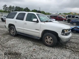 2003 Chevrolet Tahoe LT with VIN 1GNEC13Z73J344721, listed as a Copart auction lot 52083205 with 148,334 mi miles and Salvage Title. Bid and sale history available at carsss.com. Image 4.