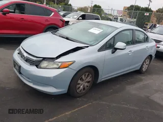 2012 Honda Civic LX with VIN 2HGFB2F58CH560126, listed as a IAAI auction lot 42097094 with 149,921 mi miles and . Bid and sale history available at DreamBid. Image 2.