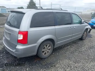 2013 Chrysler Town & Country Touring with VIN 2C4RC1BG2DR656629, listed as a IAAI auction lot 42024459 with 209,472 mi miles and . Bid and sale history available at DreamBid. Image 4.