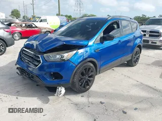 2018 Ford Escape SE z VIN 1FMCU0GD2JUC27271, wystawiony jako IAAI lot #41947047 z przebiegiem 154 672 mil mil oraz . Historia ofert i sprzedaży dostępna na DreamBid. Obrazek 2.