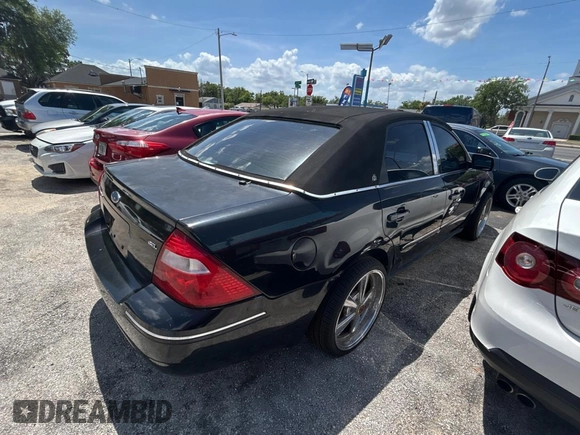 2005 Ford Five Hundred SEL z VIN 1FAFP24185G146669, wystawiony jako Copart lot #51990845 z przebiegiem Nie podano mil oraz Czysty tytuł • Clean title. Historia ofert i sprzedaży dostępna na DreamBid. Obrazek 4.