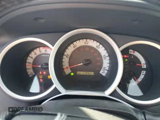 2013 Toyota Tacoma PreRunner z VIN 5TFJU4GN2DX034150, wystawiony jako Copart lot #77808844 z przebiegiem 112 621 mil mil oraz Szkoda całkowita • Salvage title. Historia ofert i sprzedaży dostępna na DreamBid. Obrazek 9.
