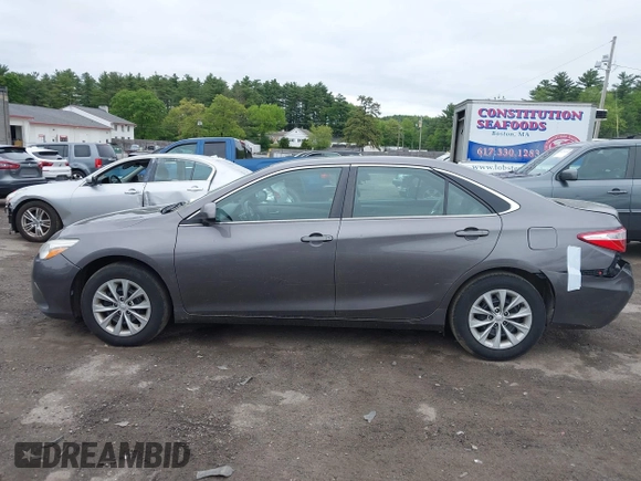 2015 Toyota Camry XLE z VIN 4T1BF1FKXFU003359, wystawiony jako IAAI lot #42309837 z przebiegiem 229 701 mil mil oraz . Historia ofert i sprzedaży dostępna na DreamBid. Obrazek 14.