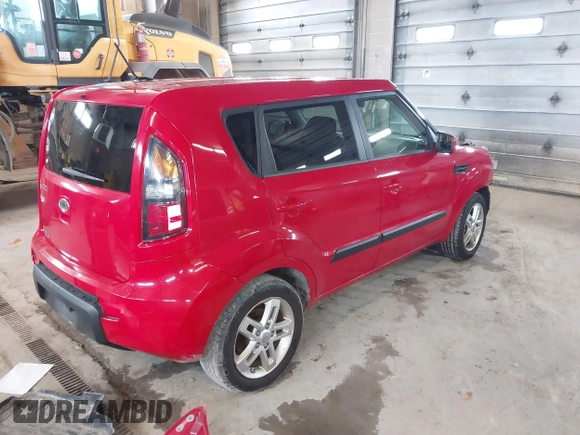 2011 Kia Soul + with VIN KNDJT2A23B7329051, listed as a IAAI auction lot 41963566 with 146,063 mi miles. Bid and sale history available at carsss.com. Image 4.