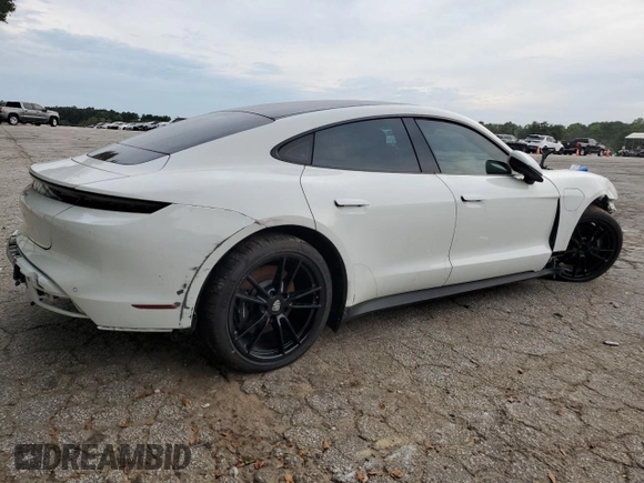 2021 Porsche Taycan z VIN WP0AA2Y19MSA13529, wystawiony jako Copart lot #75006344 z przebiegiem 23 013 mil mil oraz Tytuł czysty. Historia ofert i sprzedaży dostępna na DreamBid. Obrazek 3.