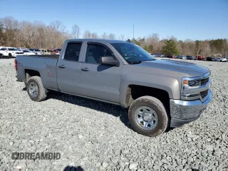 2017 Chevrolet Silverado 1500 LS with VIN 1GCRCNEC9HZ160318, listed as a Copart auction lot 49616205 with 216,814 mi miles and Salvage Title. Bid and sale history available at DreamBid. Image 4.