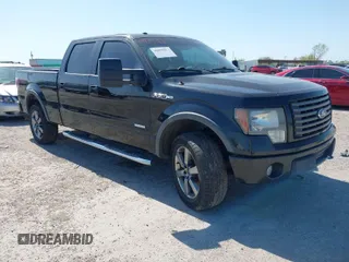 2012 Ford F-150 XL with VIN 1FTFW1ET1CFA91654, listed as a IAAI auction lot 41975166 with 230,039 mi miles. Bid and sale history available at carsss.com. Image 1.