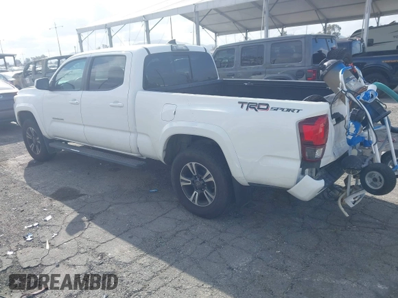 2018 Toyota Tacoma SR5 with VIN 3TMBZ5DN7JM016650, listed as a IAAI auction lot 41903835 with 105,123 mi miles and . Bid and sale history available at DreamBid. Image 3.