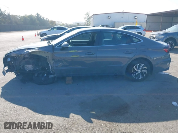 2022 Hyundai Sonata Hybrid Blue with VIN KMHL24JJ1NA041773, listed as a IAAI auction lot 41043553 with 23,696 mi miles. Bid and sale history available at carsss.com. Image 15.