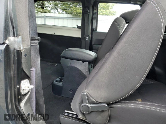 2014 Jeep Wrangler Sahara with VIN 1C4AJWBG0EL306703, listed as a Copart auction lot 51450215 with 115,932 mi miles and Salvage Title. Bid and sale history available at DreamBid. Image 11.