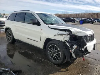 2019 Jeep Grand Cherokee Trailhawk with VIN 1C4RJFLG6KC577066, listed as a Copart auction lot 86624384 with 90,687 mi miles and Salvage Title. Bid and sale history available at carsss.com. Image 4.