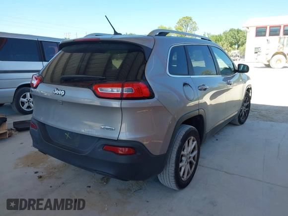 2015 Jeep Cherokee Latitude with VIN 1C4PJLCB1FW770806, listed as a IAAI auction lot 41887226 with 71,268 mi miles and . Bid and sale history available at DreamBid. Image 4.