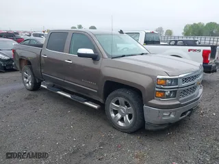 2015 Chevrolet Silverado 1500 LTZ with VIN 3GCUKSEC9FG347373, listed as a IAAI auction lot 41949424 with 129,744 mi miles. Bid and sale history available at carsss.com. Image 1.