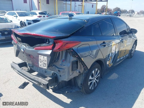 2021 Toyota Prius Prime LE with VIN JTDKAMFP1M3194060, listed as a IAAI auction lot 41805640 with 221,263 mi miles. Bid and sale history available at carsss.com. Image 4.