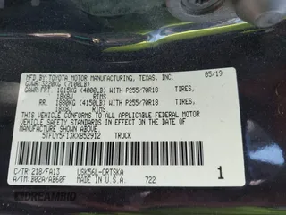 2019 Toyota Tundra SR with VIN 5TFUY5F13KX852912, listed as a IAAI auction lot 42327399 with 124,193 mi miles and . Bid and sale history available at DreamBid. Image 9.