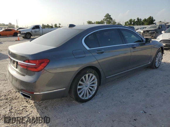 2018 BMW 7 Series 740i with VIN WBA7E2C56JG741634, listed as a Copart auction lot 61530123 with 82,207 mi miles. Bid and sale history available at carsss.com. Image 3.