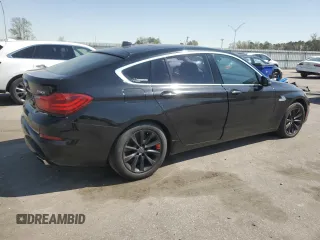2014 BMW 5 Series GT 550i xDrive with VIN WBA5M0C5XED084908, listed as a Copart auction lot 50619945 with 97,680 mi miles and Salvage Title. Bid and sale history available at carsss.com. Image 3.