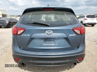 2015 Mazda CX-5 Sport z VIN JM3KE2BE8F0434116, wystawiony jako Copart lot #60712625 z przebiegiem 300 405 mil mil oraz Szkoda całkowita • Salvage title. Historia ofert i sprzedaży dostępna na DreamBid. Obrazek 6.