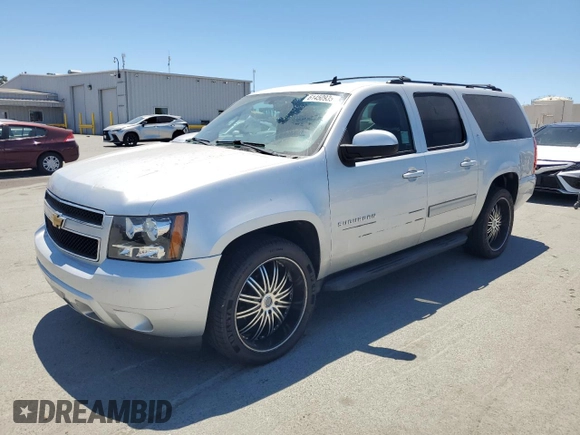2013 Chevrolet Suburban LT with VIN 1GNSCJE09DR105725, listed as a Copart auction lot 61450935 with 171,659 mi miles and Salvage title. Bid and sale history available at DreamBid. Image 1.