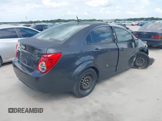 2013 Chevrolet Sonic LS with VIN 1G1JA5SH4D4138164, listed as a IAAI auction lot 42677319 with 144,244 mi miles and . Bid and sale history available at DreamBid. Image 4.