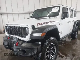 2024 Jeep Wrangler Rubicon with VIN 1C4PJXFG7RW334190, listed as a IAAI auction lot 42332948 with 14,272 mi miles and . Bid and sale history available at DreamBid. Image 17.
