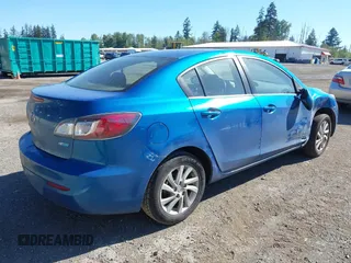 2012 Mazda 3 i Touring with VIN JM1BL1V77C1640555, listed as a IAAI auction lot 42180402 with 87,032 mi miles and . Bid and sale history available at DreamBid. Image 4.
