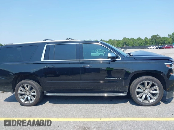 2019 Chevrolet Suburban LT with VIN 1GNSCJKC5KR304766, listed as a IAAI auction lot 42410264 with 105,171 mi miles and . Bid and sale history available at DreamBid. Image 13.