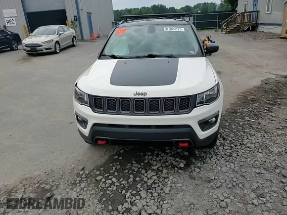 2019 Jeep Compass Trailhawk with VIN 3C4NJDDB5KT671613, listed as a Copart auction lot 61023125 with 64,793 mi miles and Salvage title. Bid and sale history available at DreamBid. Image 14.